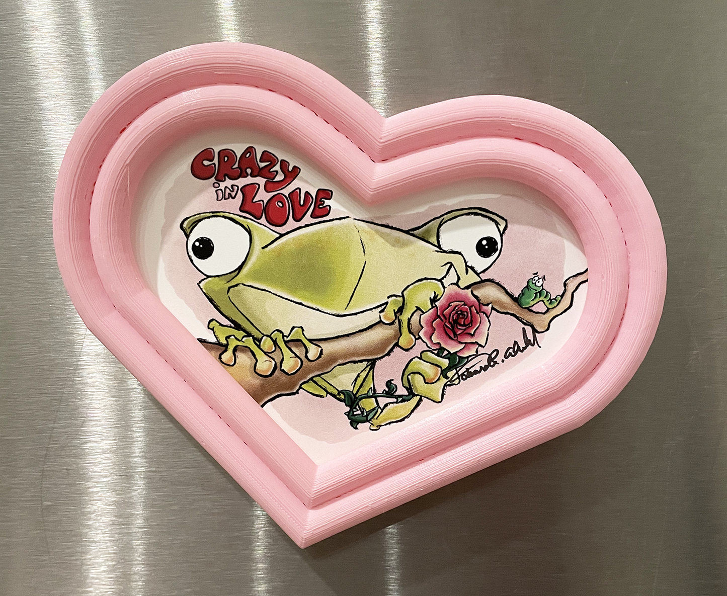 Illustrated Frog Magnet in custom designed 3D printed frame.