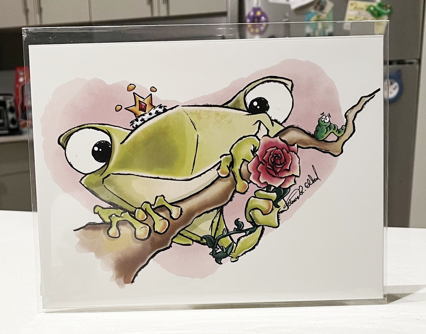 Illustrated Frog print in protective sleeve and backing board.