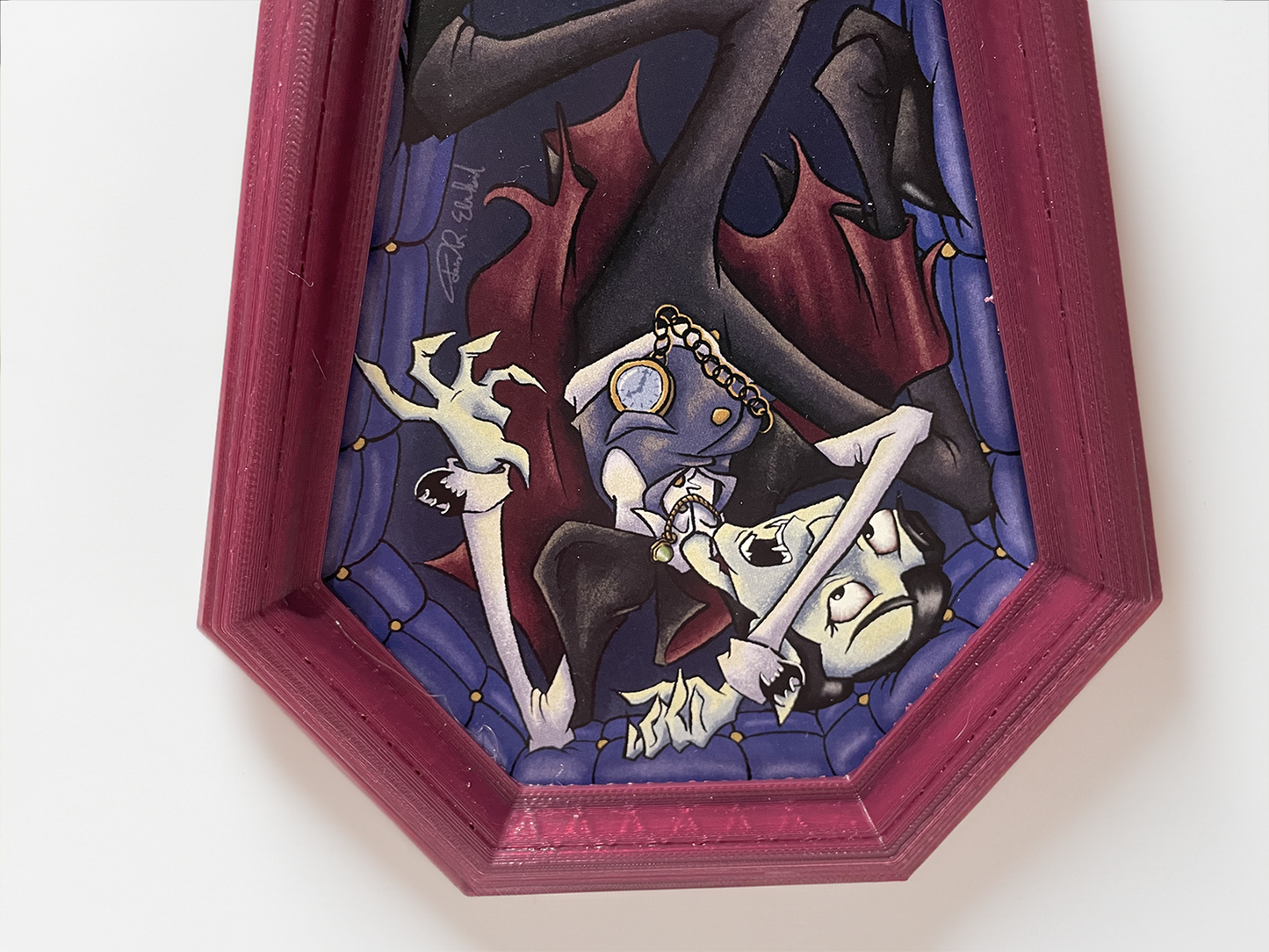 Illustrated Dracula in a custom designed, 3D printed frame.