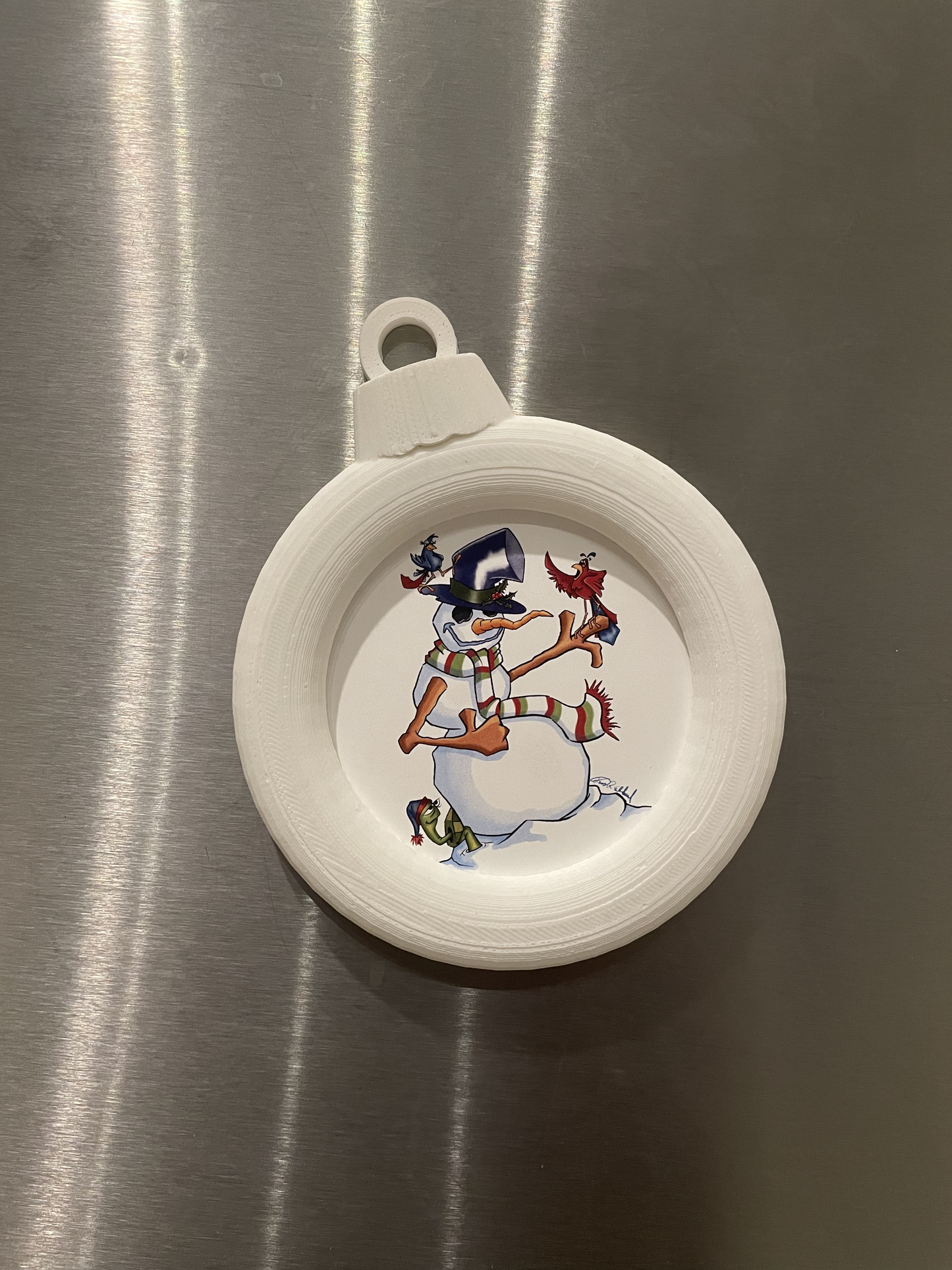 Illustrated Snowman Magnet in custom designed 3D printed frame.