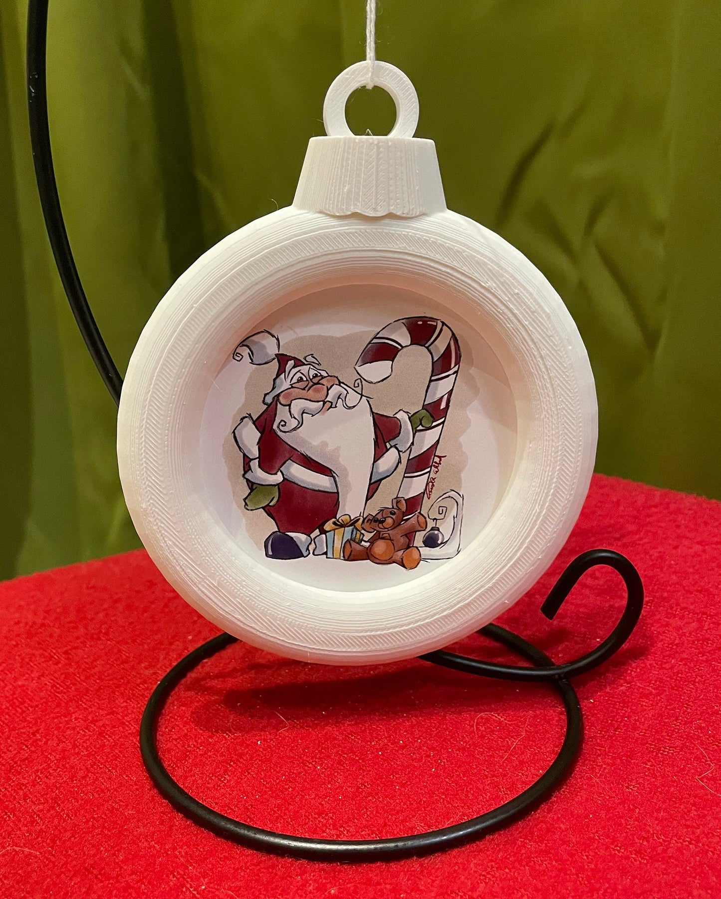 Illustrated Santa Magnet in custom designed 3D printed frame.